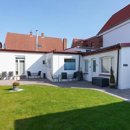 Апартаменты Ferienapartment Suederstrasse Боркум